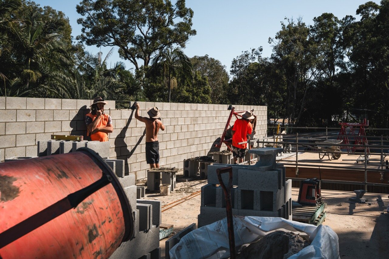 Trades working on blockwork at 75 Yandina Coolum Road